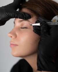 side-view-woman-getting-her-eyebrows-done